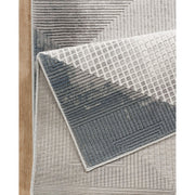 Geometrix - 5'3" X 7'3" Area Rug With Geometric, 3D Effect - Gray / Ivory - R&R Furniture Gallery (Fountain Valley, CA)