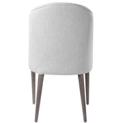 Pair of Uttermost Brie armless chairs set, modern design with upholstered seats and wooden legs, ideal for living spaces.
