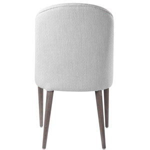 Pair of Uttermost Brie armless chairs set, modern design with upholstered seats and wooden legs, ideal for living spaces.
