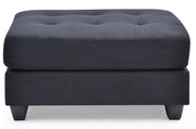 Contemporary upholstered ottoman by Glory Furniture with a sleek, modern design and plush fabric in a stylish living room setting.