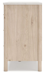 Six-drawer dresser from Signature Design by Ashley® featuring a modern wood finish and sleek metal handles.