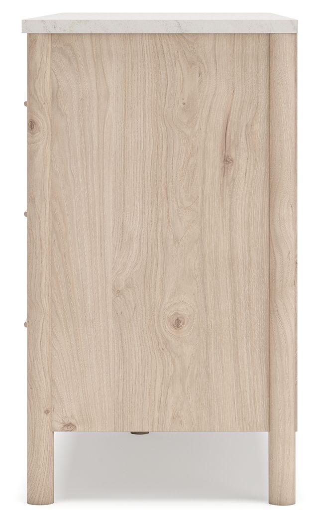 Six-drawer dresser from Signature Design by Ashley® featuring a modern wood finish and sleek metal handles.