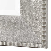 Silver Leiston metallic wall mirror by Uttermost featuring a sleek, reflective surface and modern design.