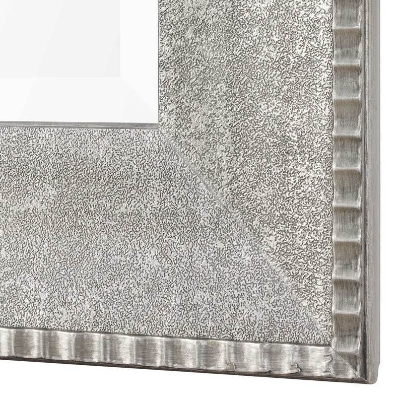 Silver Leiston metallic wall mirror by Uttermost featuring a sleek, reflective surface and modern design.
