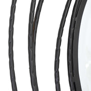 Uttermost Whirlwind round wall mirror with a sleek, modern frame, reflecting light and adding style to any room.