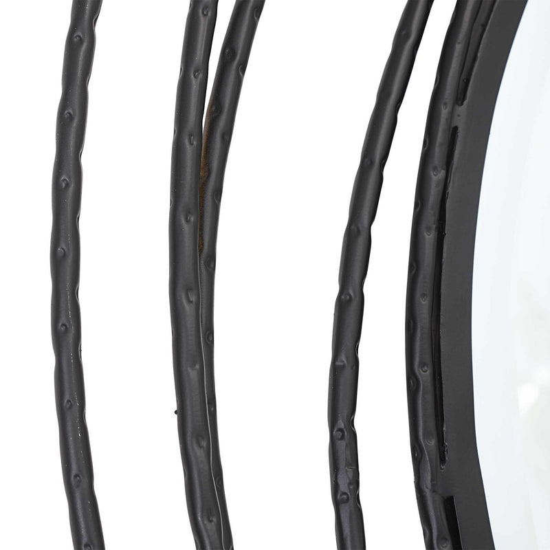 Uttermost Whirlwind round wall mirror with a sleek, modern frame, reflecting light and adding style to any room.