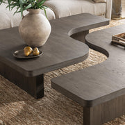 Classic Home Melina coffee table with a sleek wooden surface and modern design, ideal for living room decor.