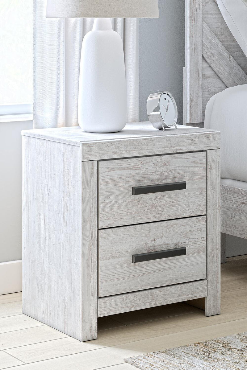 Whitewashed Cayboni two-drawer accent nightstand by Signature Design by Ashley® with sleek wood finish and modern design.