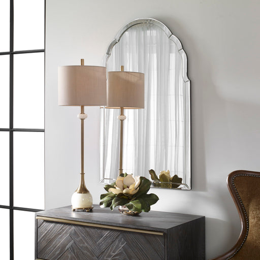 Uttermost Brayden frameless arched wall mirror with pearl silver finish, showcasing its elegant curved design and sleek frame.