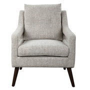 Uttermost O'Brien armchair with plush upholstery and wooden legs, showcasing a stylish and comfortable seating design.