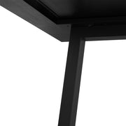 Simpli-Home Whitley dining table with a wooden finish, showcasing a spacious rectangular surface and sturdy legs.
