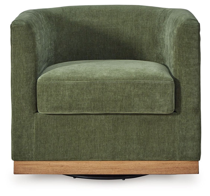 Forest green Jersonlow swivel chair by Signature Design by Ashley® with a modern, cushioned seat and rotating base.