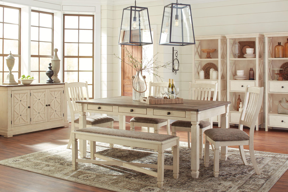 Set of two Bolanburg dining UPH side chairs by Signature Design Ashley with rake back in brown and beige fabric.