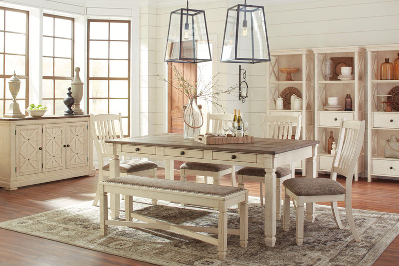 Set of two Bolanburg dining UPH side chairs by Signature Design Ashley with rake back in brown and beige fabric.