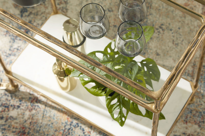 Plattfield - Bar Cart - Antique Gold Finish - R&R Furniture Gallery (Fountain Valley, CA)
