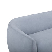 TOV Furniture Jordan stationary loveseat with plush cushioning and modern design, shown in a cozy living room setting.