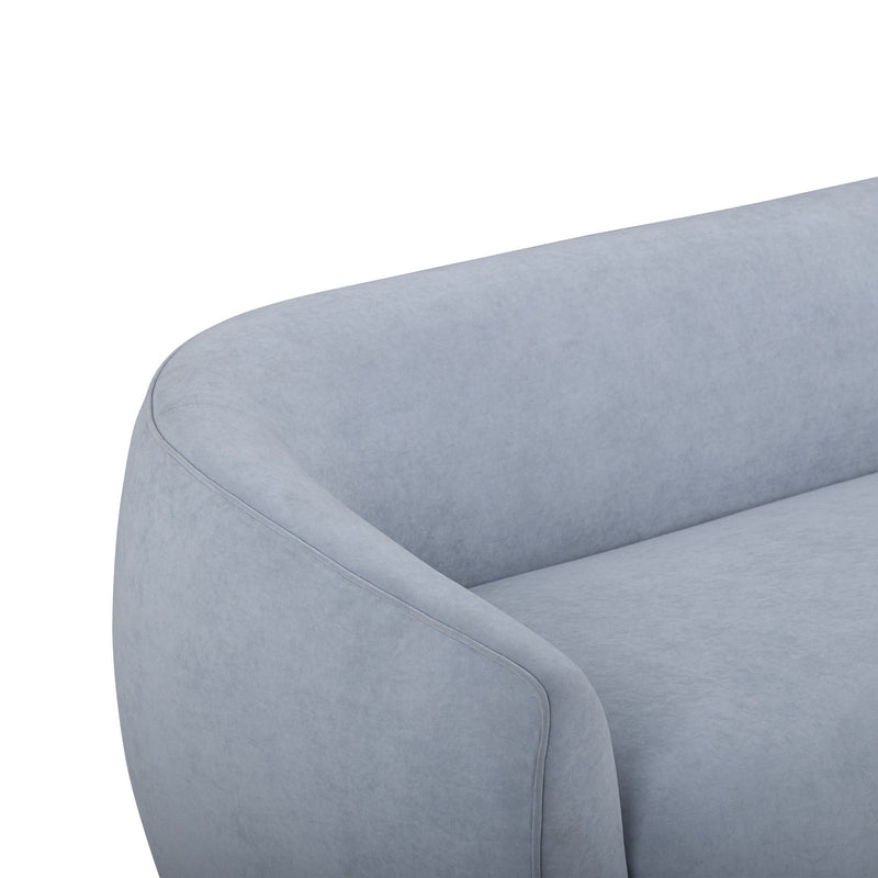 TOV Furniture Jordan stationary loveseat with plush cushioning and modern design, shown in a cozy living room setting.
