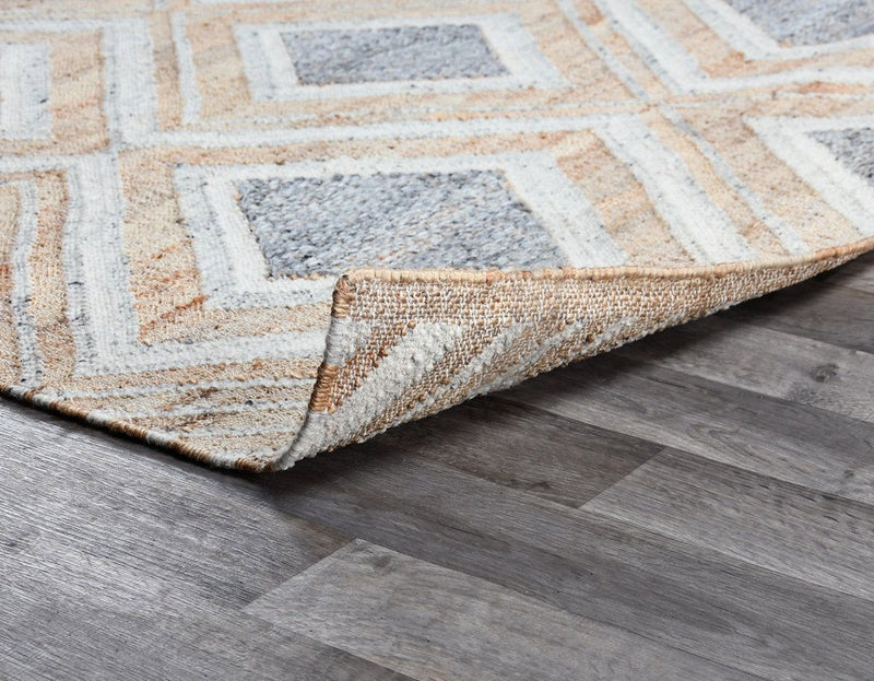 Classic Home Laguna area rug featuring intricate patterns and warm colors, perfect for adding style to any room.