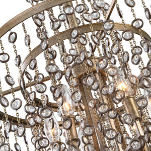 Uttermost Valka 6-light crystal chandelier with light brown finish, featuring elegant hanging crystal accents and a modern chandelier design.
