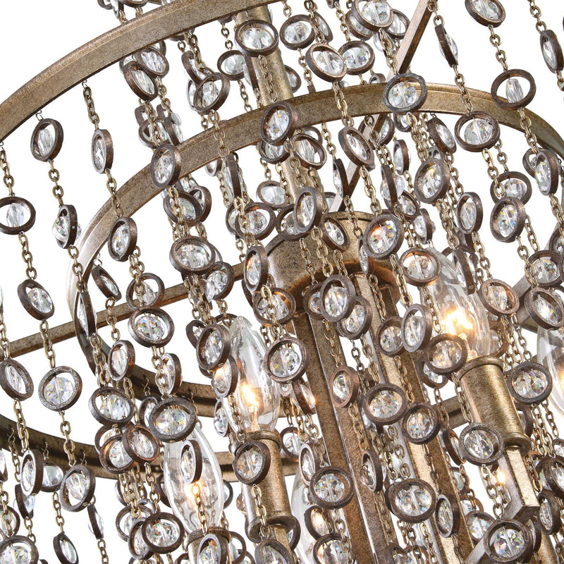 Uttermost Valka 6-light crystal chandelier with light brown finish, featuring elegant hanging crystal accents and a modern chandelier design.