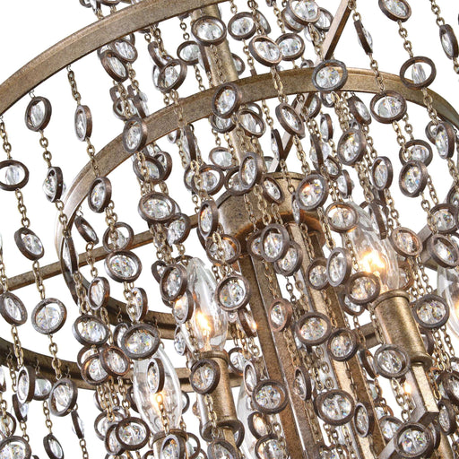 Uttermost Valka 6-light crystal chandelier with light brown finish, featuring elegant hanging crystal accents and a modern chandelier design.