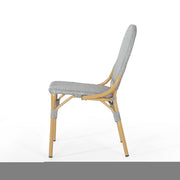 Set of two Noble House outdoor rattan and aluminum armless French bistro chairs in dark gray for patio or garden seating.