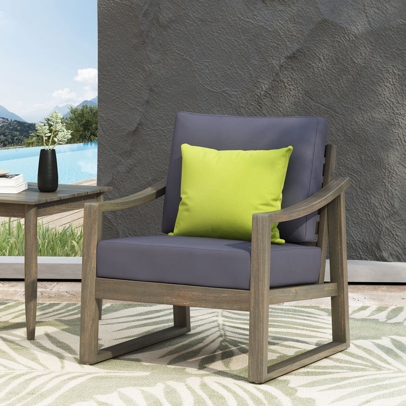 Noble House Samwell outdoor club arm chair with plush cushions and sturdy frame, ideal for patio or garden seating.