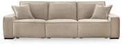 Benchcraft® Carceri reclining sectional sofa with plush cushions and multiple recliners, perfect for comfortable family living.