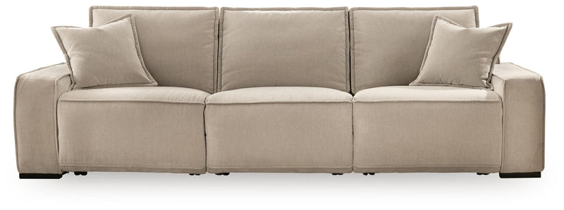 Benchcraft® Carceri reclining sectional sofa with plush cushions and multiple recliners, perfect for comfortable family living.