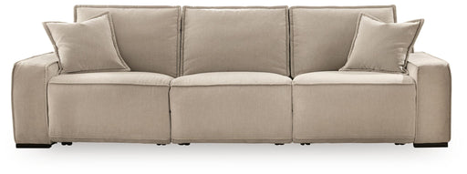 Benchcraft® Carceri reclining sectional sofa with plush cushions and multiple recliners, perfect for comfortable family living.
