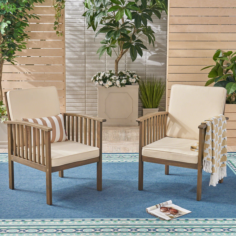 Pair of Noble House Casa Acacia wood club chairs with water-resistant gray and cream cushions, set of two for outdoor seating.