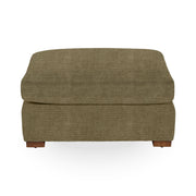 Classic Home Audrey upholstered ottoman with plush fabric and tufted top, perfect as a versatile living room accent piece.