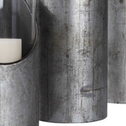 Set of three Uttermost Karter iron and glass candleholders in pearl silver and dark gray, featuring modern candle display design.
