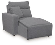 Signature Design by Ashley Modmax II reclining sectional in salt and pepper fabric, featuring plush cushions and reclining seats.