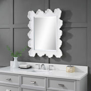 Uttermost Sea Coral wall mirror featuring a textured coral-inspired frame in a natural finish, perfect for coastal decor.