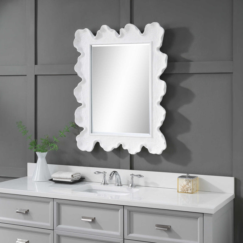 Uttermost Sea Coral wall mirror featuring a textured coral-inspired frame in a natural finish, perfect for coastal decor.