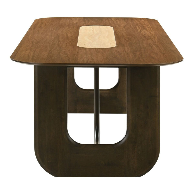 Kyree Walnut Dining Table by ACME, showcasing a sleek wooden surface and sturdy legs in a modern dining room setting.