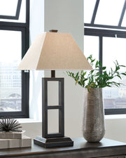 Pair of Deidra Table Lamps by Signature Design by Ashley®, featuring neutral fabric shades and sleek ceramic bases.
