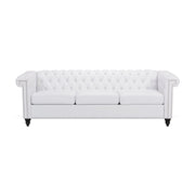 Noble House Chesterfield style 3-seater sofa with deep button tufting and plush upholstery, stationary design in a classic living room setting.