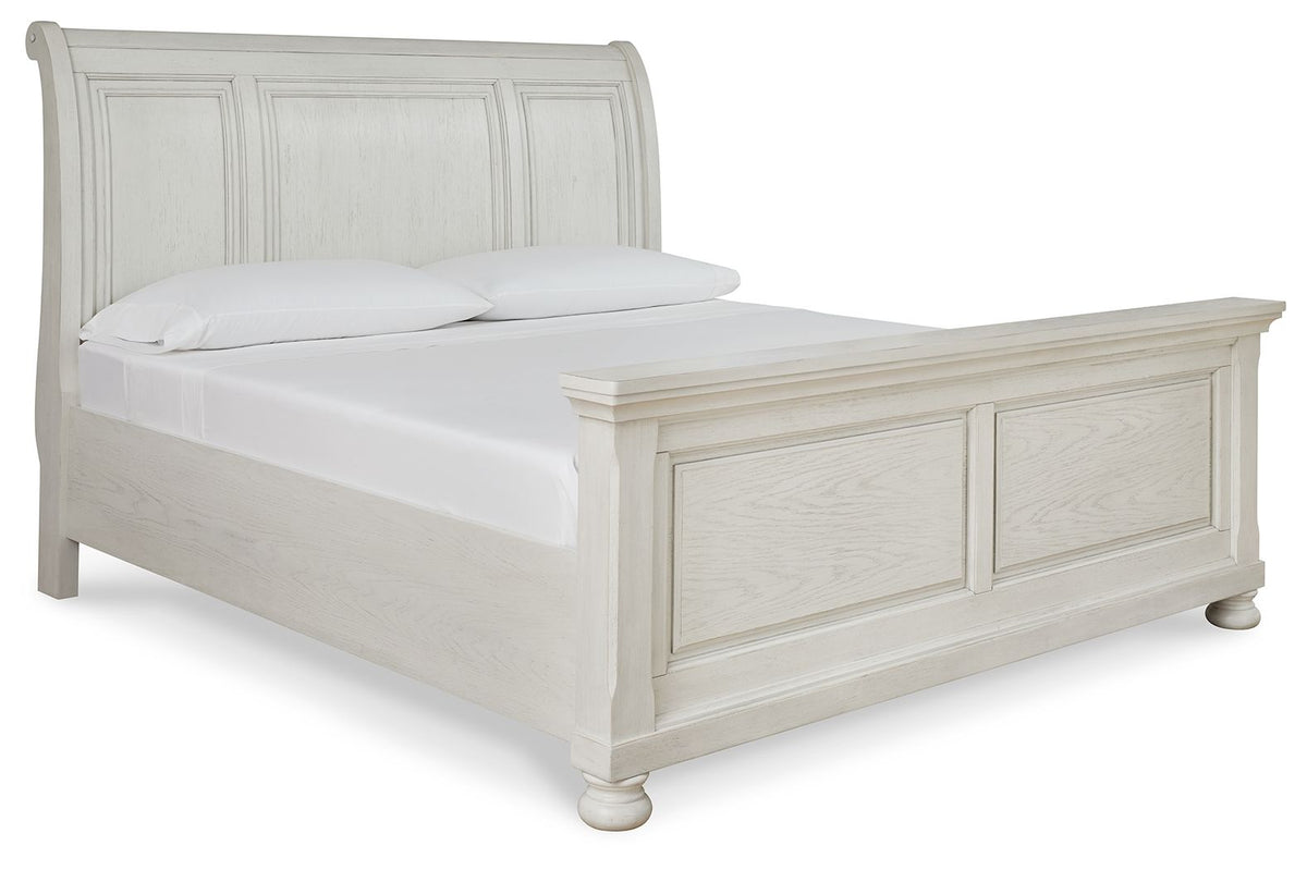 Signature Design by Ashley Robbinsdale sleigh bed with built-in storage drawers in a classic wooden finish.
