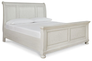 Signature Design by Ashley Robbinsdale sleigh bed with built-in storage drawers in a classic wooden finish.