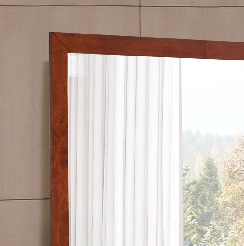 Glory Furniture Burlington modern transitional wall mirror with sleek frame hanging on a wall in contemporary decor style.