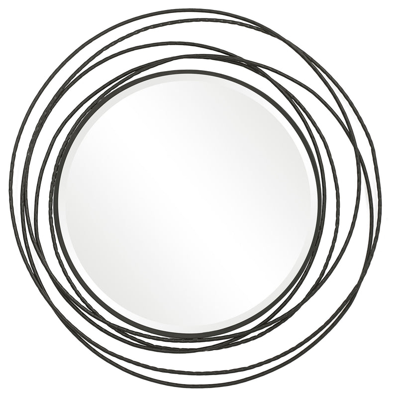 Uttermost Whirlwind round wall mirror with a sleek frame, reflecting modern interior decor.