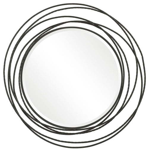 Uttermost Whirlwind round wall mirror with a sleek frame, reflecting modern interior decor.