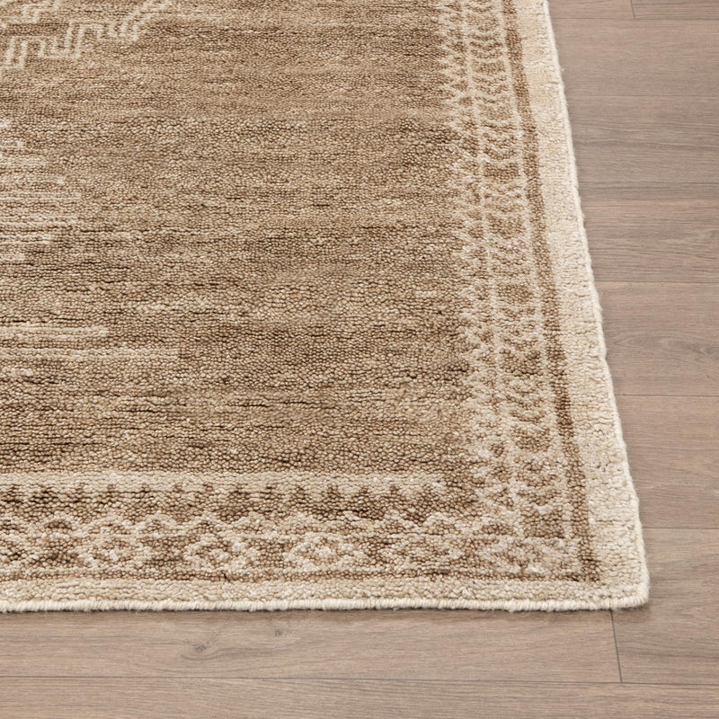 Classic Home Luxor Cairo hand-knotted rug featuring intricate geometric patterns in warm tones, ideal for living room decor.