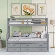DreamHaus bunk bed with twin size trundle and storage drawers, featuring sturdy wood construction and a modern design for kids' bedrooms.