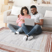 Marfi - Bordered Area Rug - R&R Furniture Gallery (Fountain Valley, CA)