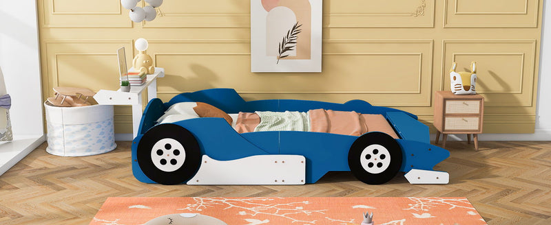 Race Car-Shaped Platform Bed With Wheels - R&R Furniture Gallery (Fountain Valley, CA)