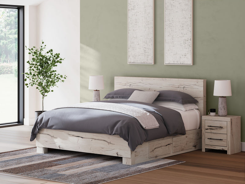 Signature Design by Ashley Lawroy panel storage bed with built-in drawers and modern wood finish, showcasing a sleek bedroom furniture piece.