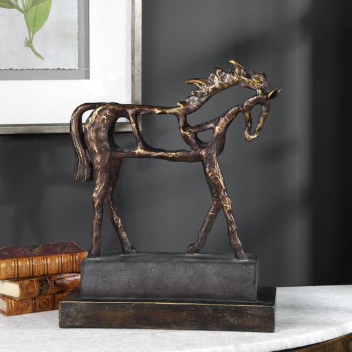 Dark brown Titan Horse sculpture by Uttermost, detailed horse figurine with muscular features and dynamic stance.